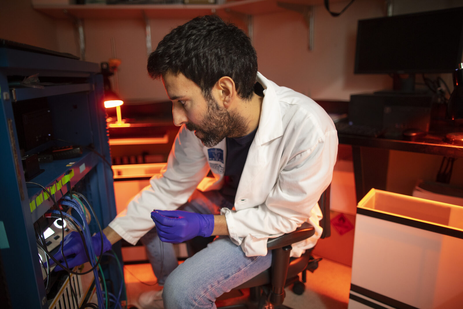 Jaume Taura working with neuroscience equipment